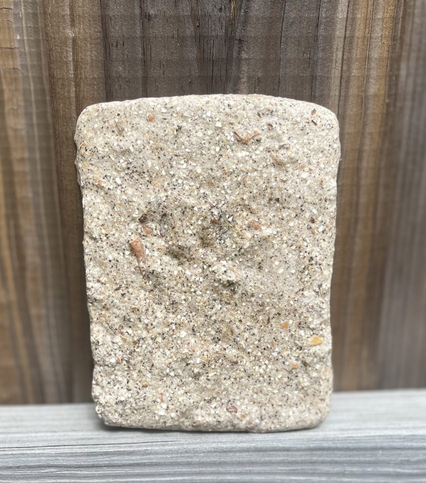 a photograph of a beige stone