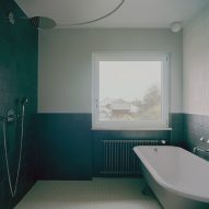 Bathroom with white and green walls