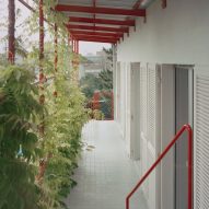 Red steel details on balcony