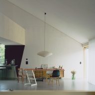 Dining table inside open-plan living space