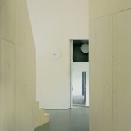 Plywood staircase inside multigenerational home