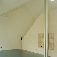 Plywood mezzanine above living space
