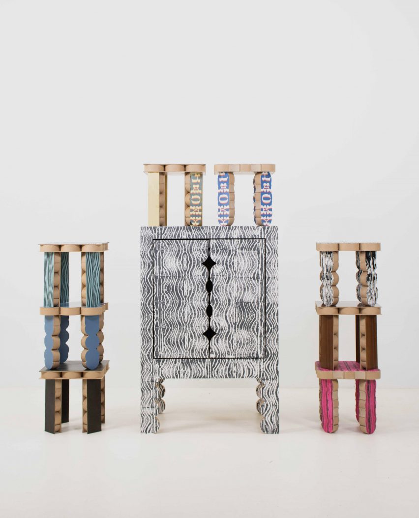 a photograph of stools and a cabinet in tones of black, white, beige, red and green