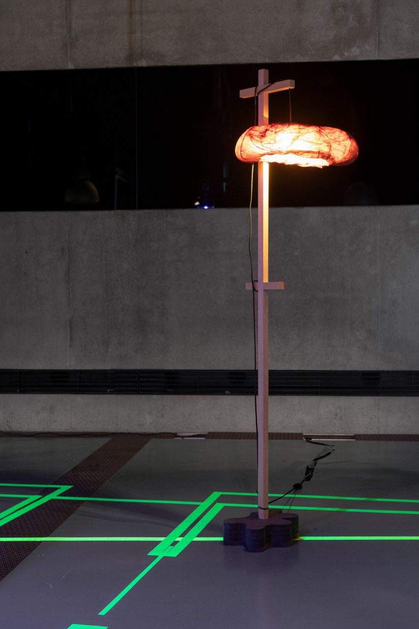 a photograph of a pole with an illuminated object attached to it