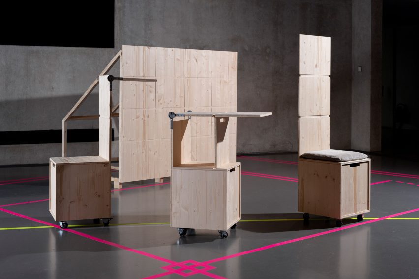a photograph of wooden structures in an exhibition