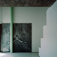 A House with an Inverted Roof by Fala Atelier