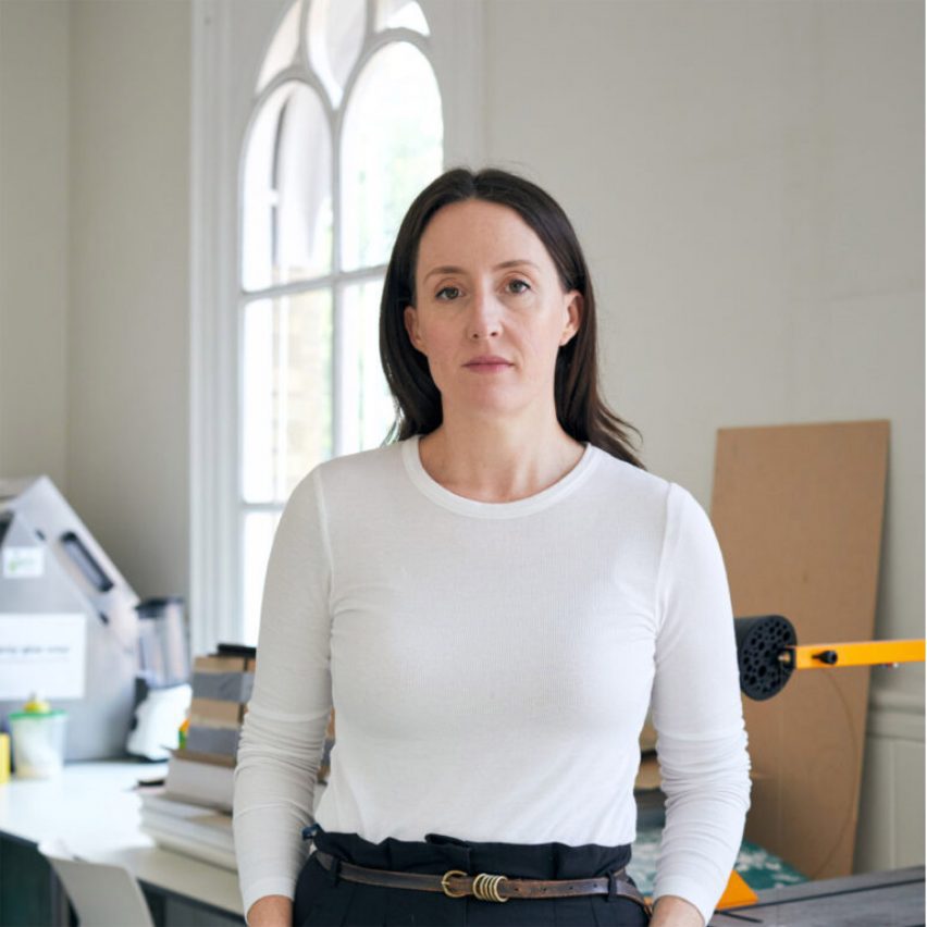 a photograph of a person in white clothing