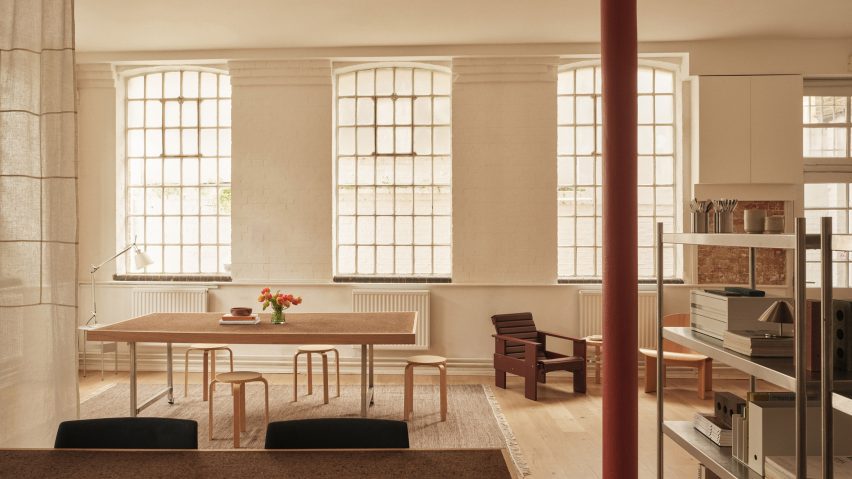 Neutral workspace with large factory windows