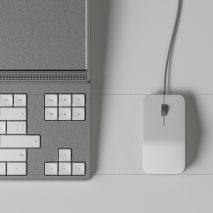 Photo of a grey keyboard and a mouse