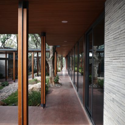 Chu's Orange Manor Living Center by Suzao Architects