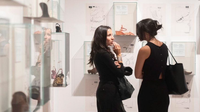 Students looking at a project on the wall