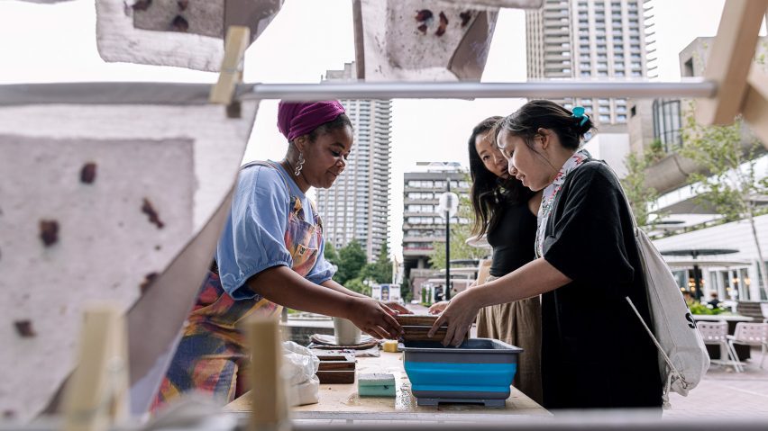 a photograph of students working together