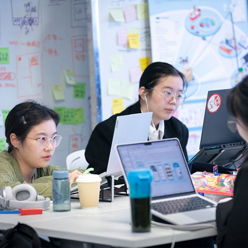 a photograph of students at a desk