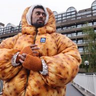 a photograph of a person wearing a brown puffer jacket