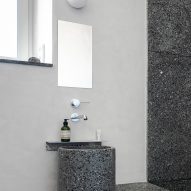 Bathroom lined with recycled plastic terrazzo