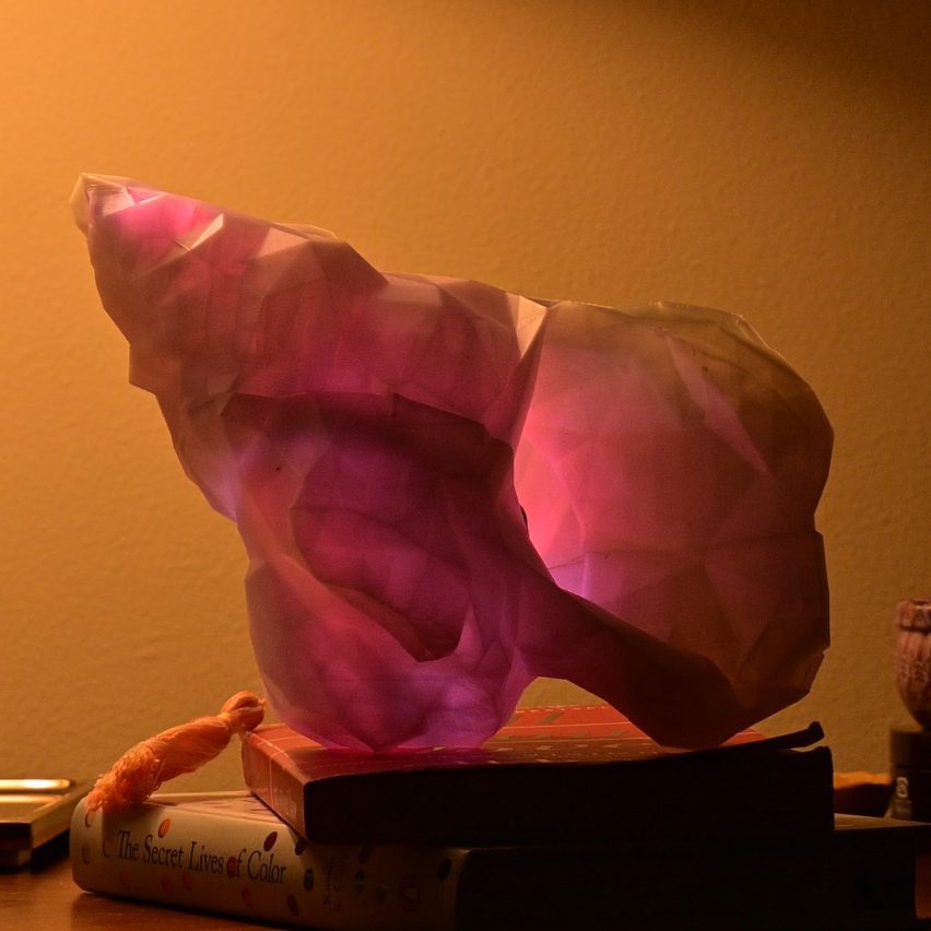 a photograph of an installation in tones of orange and pink
