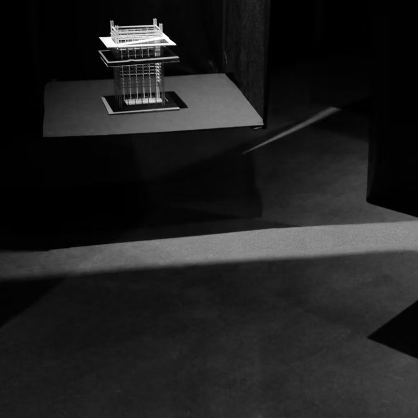a black and white image of an exhibition