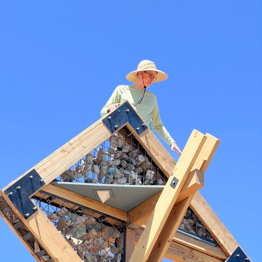 a photograph of a person on a wooden structure
