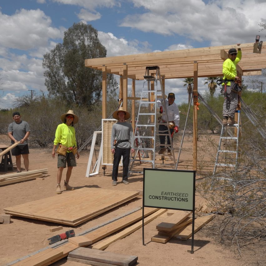 a photograph of people working on a construction project