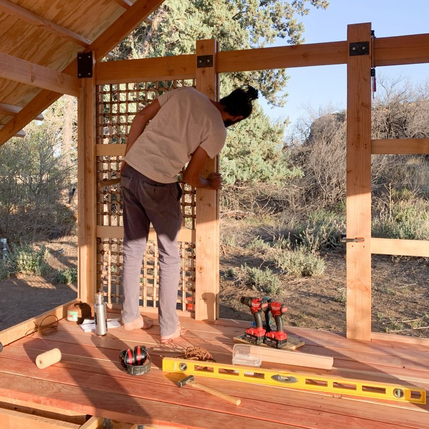 a photograph of a person working on a construction project