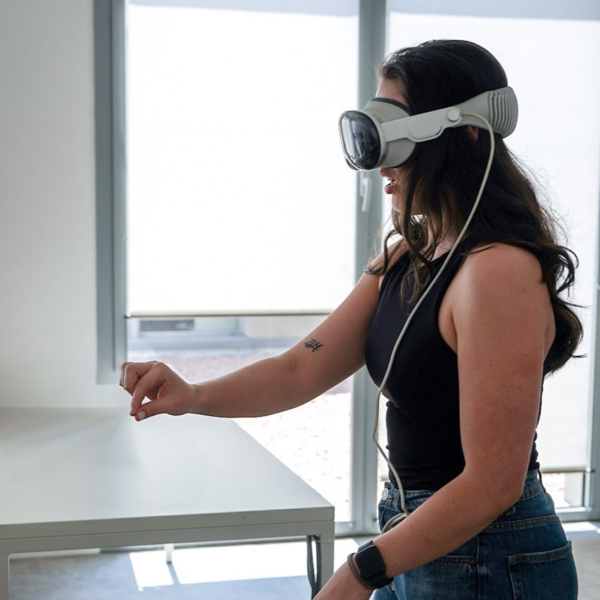 a photograph of a person with a VR headset on