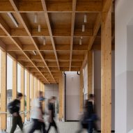 Timber colonnade outside performing arts centre