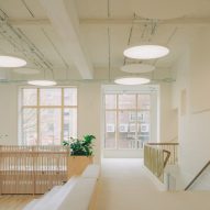 Large windows looking out of Studio Dera retrofit project