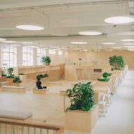 Person sitting on bench in educational building