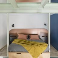 Bedroom with metal headboard in RA House by StudioTamat