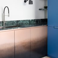 Kitchen with marble counter in RA House by StudioTamat