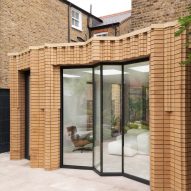 Bureau de Change adds yellow-brick extension to W House in London
