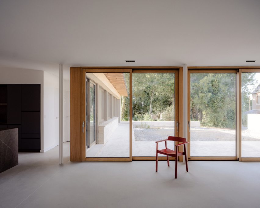 Living space interior at House on Rue de Clermont by A.TM