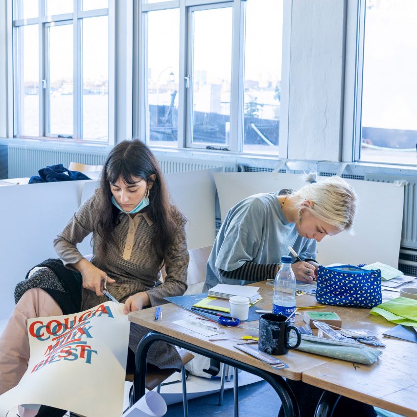 graphic design students working at desks
