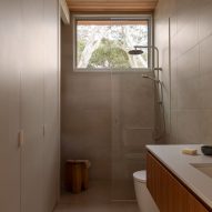 Bathroom with shower and window