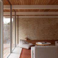Living space with orange rug