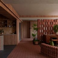 L Architects uses double-bullnose bricks to create flat that "plants would enjoy"