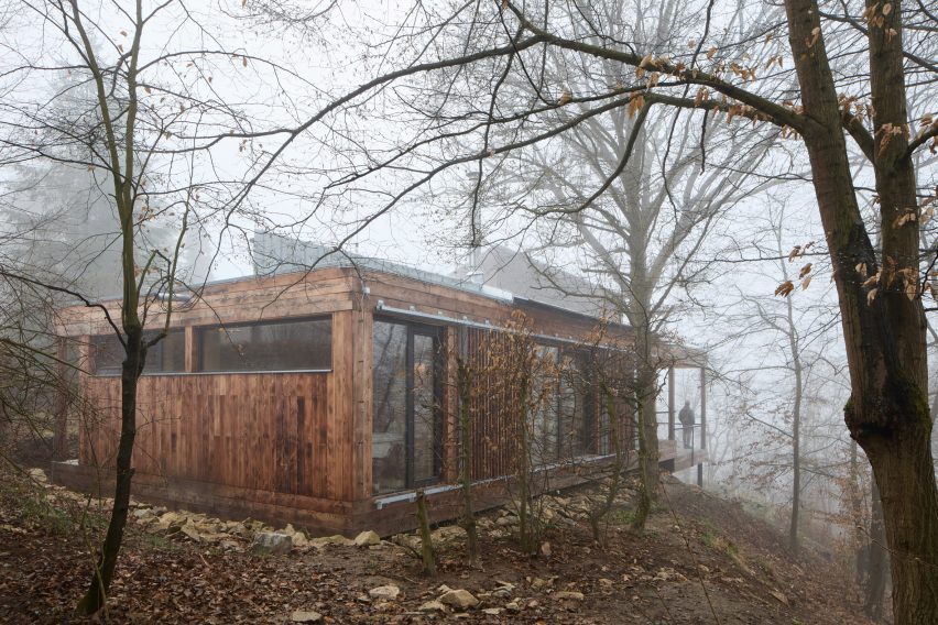 Larch-clad exterior of home extension by Päivä Architekti
