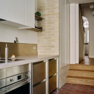 Steel kitchen cabinets in Stone and Steel House extension by DGN Studio and Sarah Izod