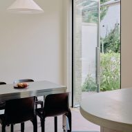 Table in Stone and Steel House extension by DGN Studio and Sarah Izod