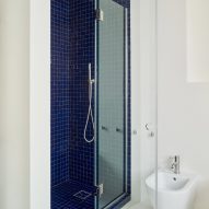 Bathroom in Stone and Steel House extension by DGN Studio and Sarah Izod
