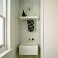 Bathroom in Stone and Steel House extension by DGN Studio and Sarah Izod