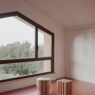 Loft with rubber floors in revamp of 1960s villa by StudioTamat