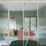 Fluted glass doors in revamp of 1960s villa by StudioTamat