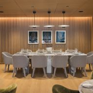 Dining space with wood walls