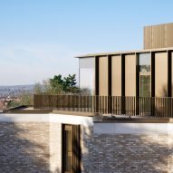 Rooftop apartment with bronze details and terrace