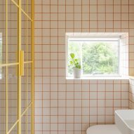 En-suite bathroom with red grouting