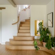Timber staircase with curving bannister