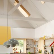 Kitchen with pitched roof and beams
