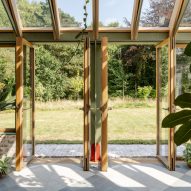 Wooden doors opening out from conservatory