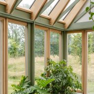 Plant-filled conservatory added to house in Kent